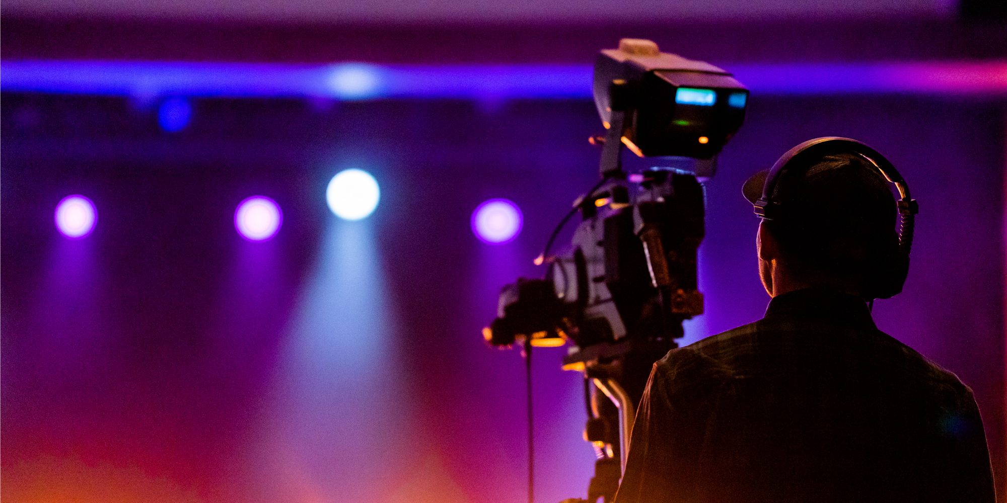 Camera operator producing a professional live broadcast